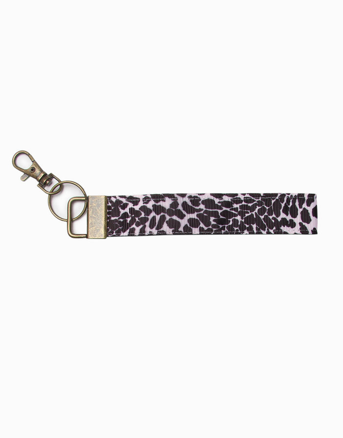 Leopard print keychain with gold clasp on a white background